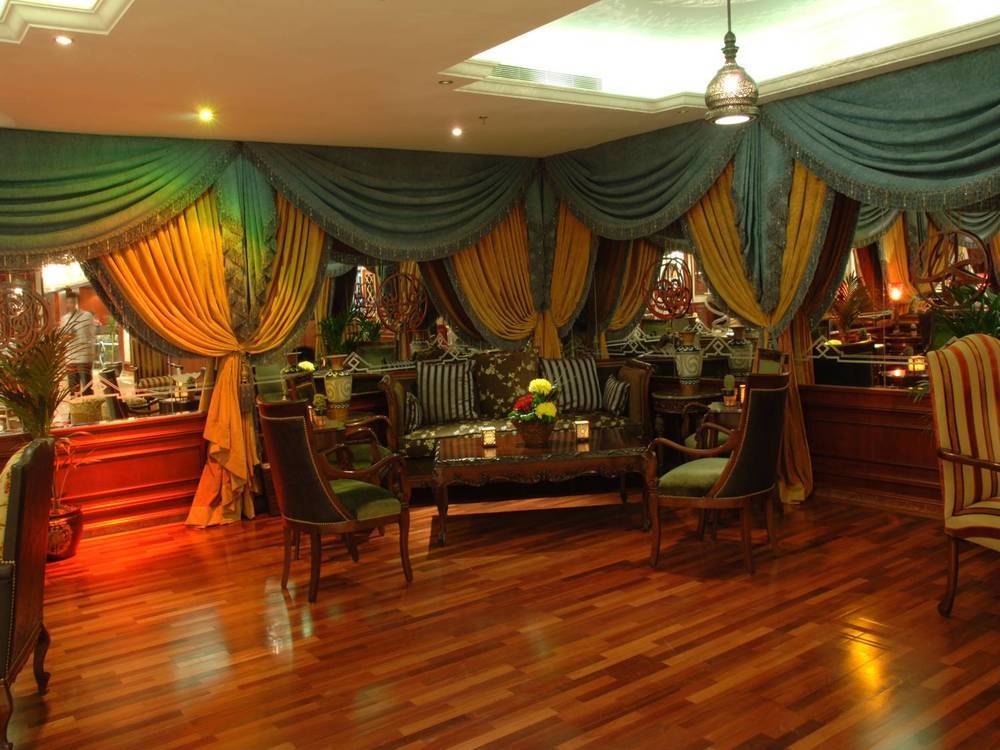 Al Shohada By Palm Rich Makkah Mecca Exterior foto The interior of the restaurant