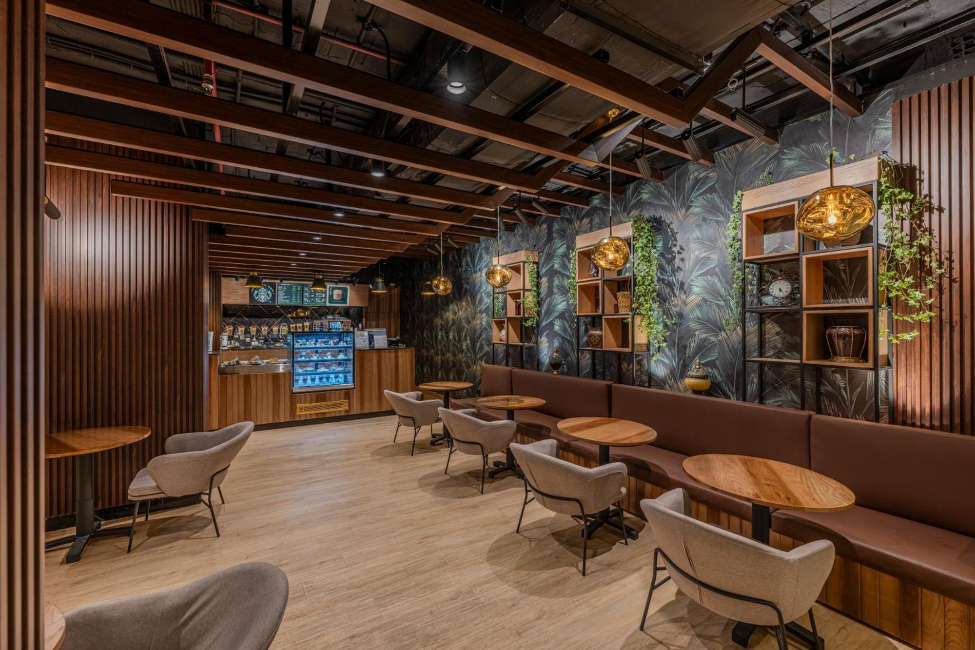 Al Shohada By Palm Rich Makkah Mecca Exterior foto Interior of a Starbucks Reserve store in Shanghai, China